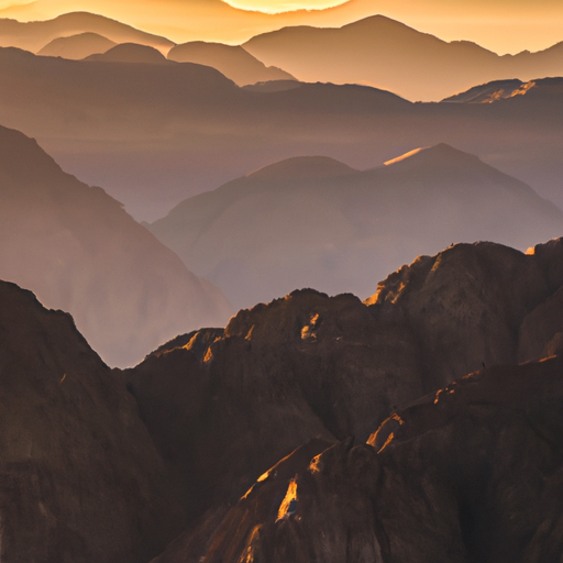 A breathtaking view of Mount Sinai under the golden sunrise, casting an ethereal glow over the rugged terrain.